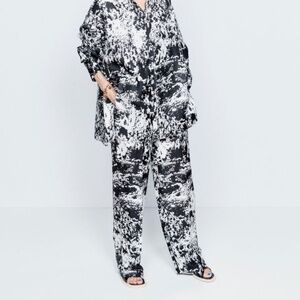 RAEY black white abstract crowd print tailored silk trousers